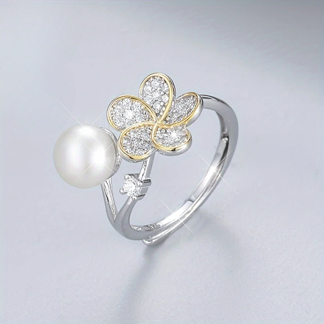 Glänzender Silberring mit Perle und Blume