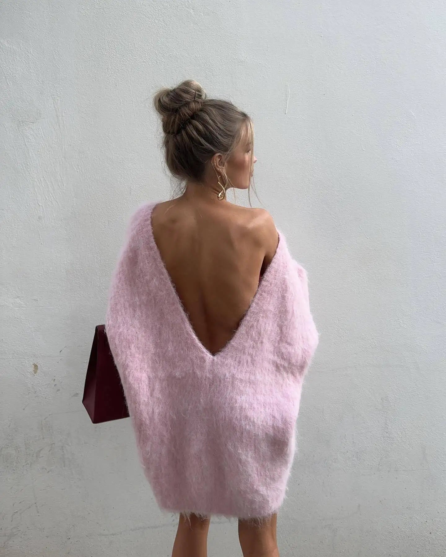 Maglione dolce e pigro con schiena scoperta di Aurora