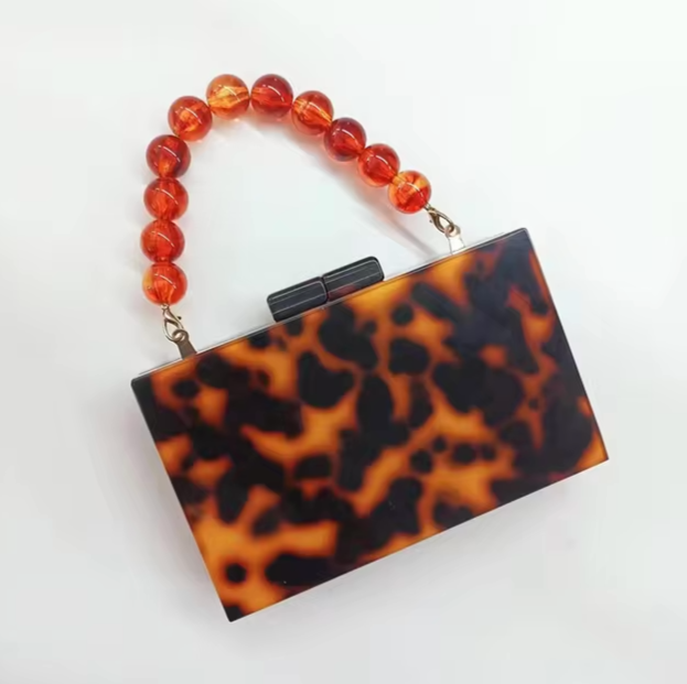 Raylene Elegante Acrylhandtasche