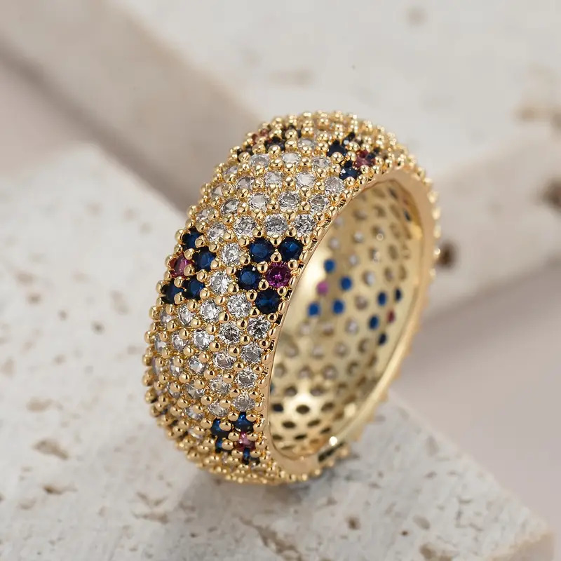 Perforierter Goldring mit blauem und violettem Zirkonium